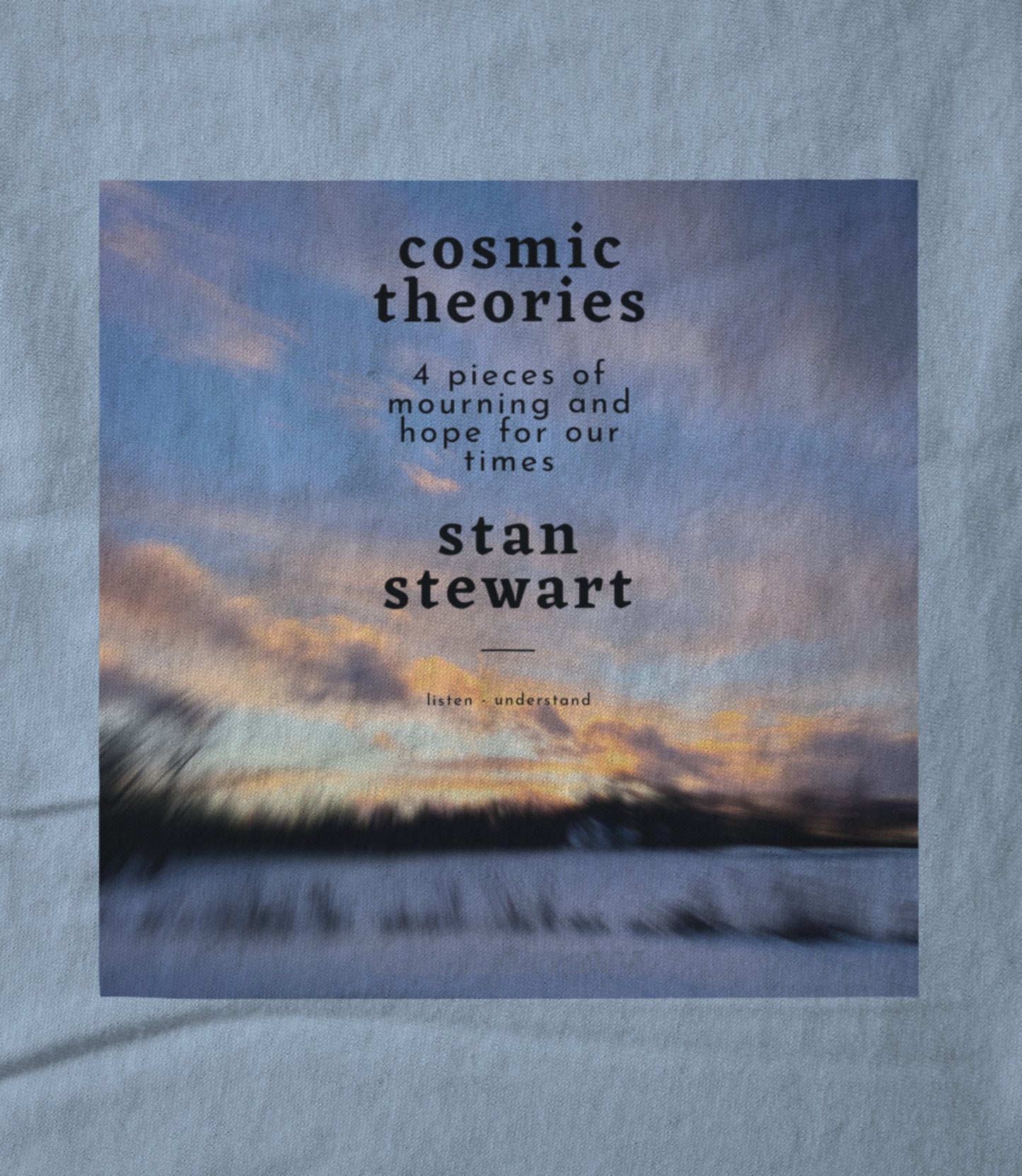 Cosmic Theories cover on light blue Unisex T-shirt
